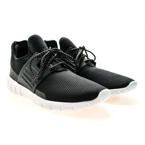 Black mesh running shoes with white soles