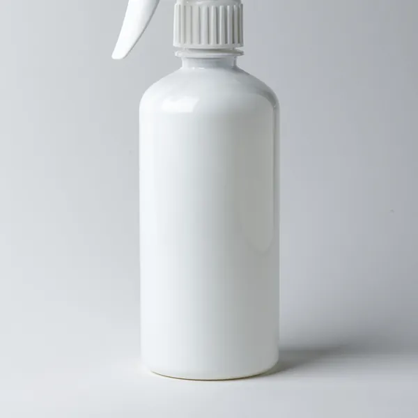 White spray bottle of shoe waterproofing spray